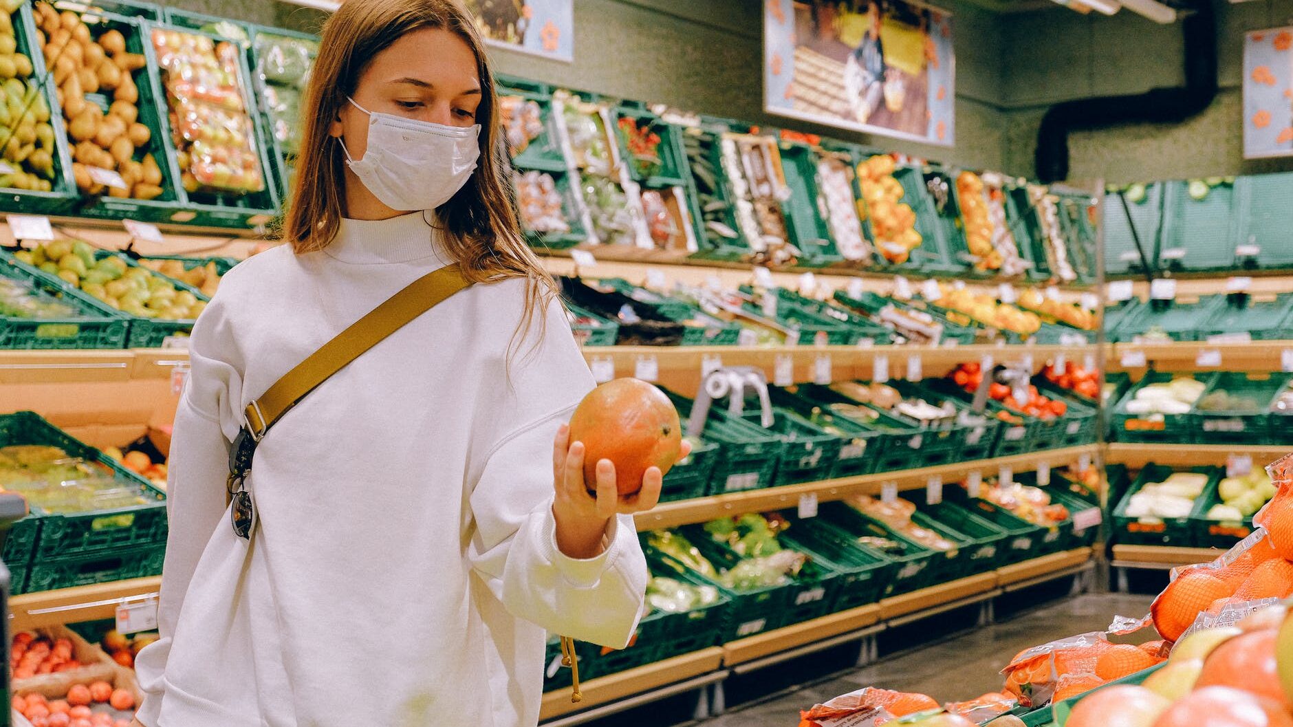 woman wearing mask in supermarket